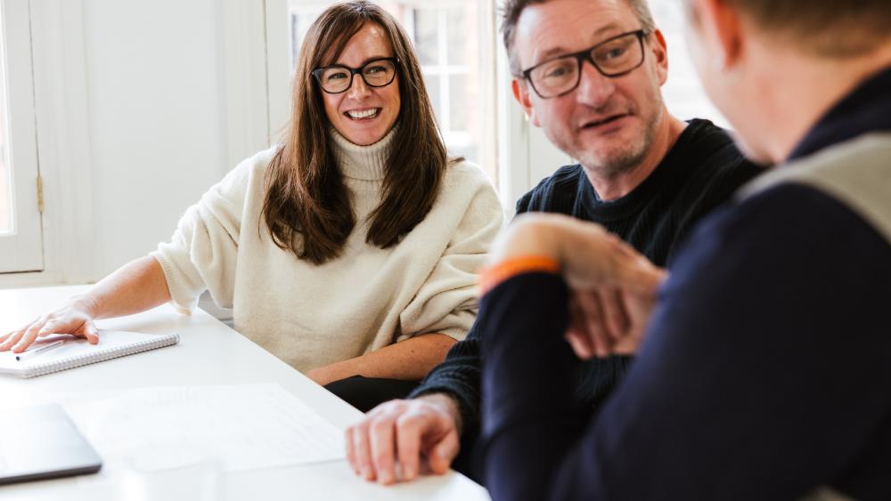 three people discussing something