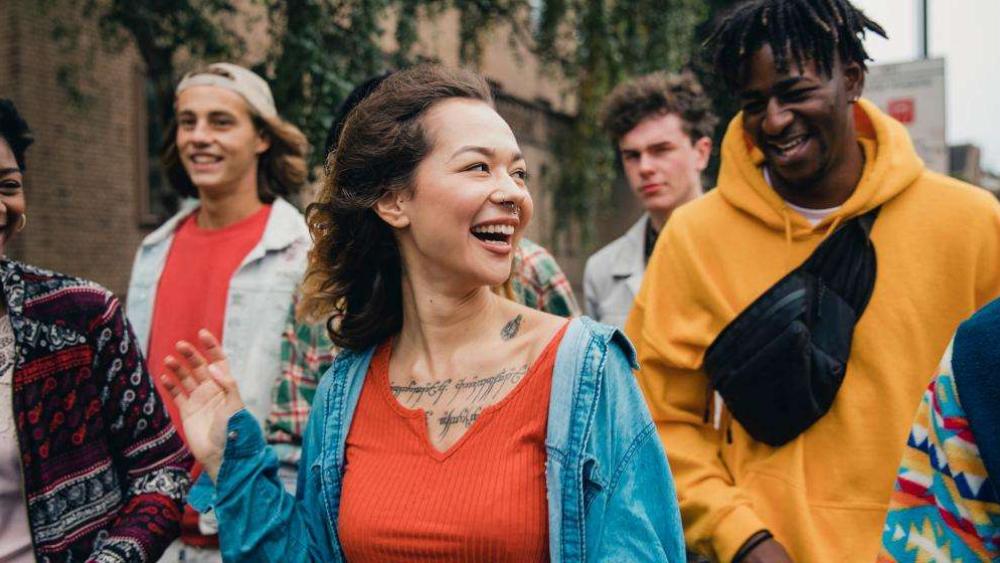 young people walking along together