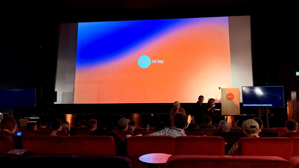 The big projector screen at all day hey conference 2026