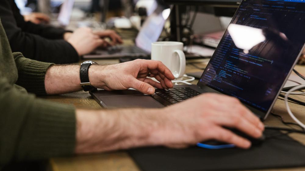 Numiko developer working on a laptop