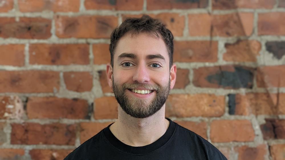 Josh posing for a headshot