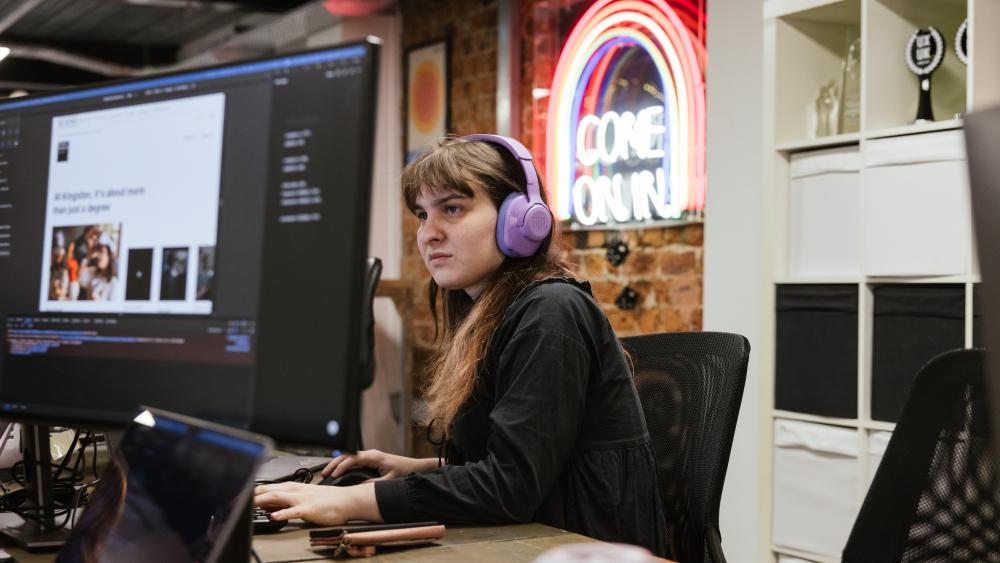 Aurora working at a desk in the Numiko office