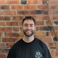 Josh posing for a headshot
